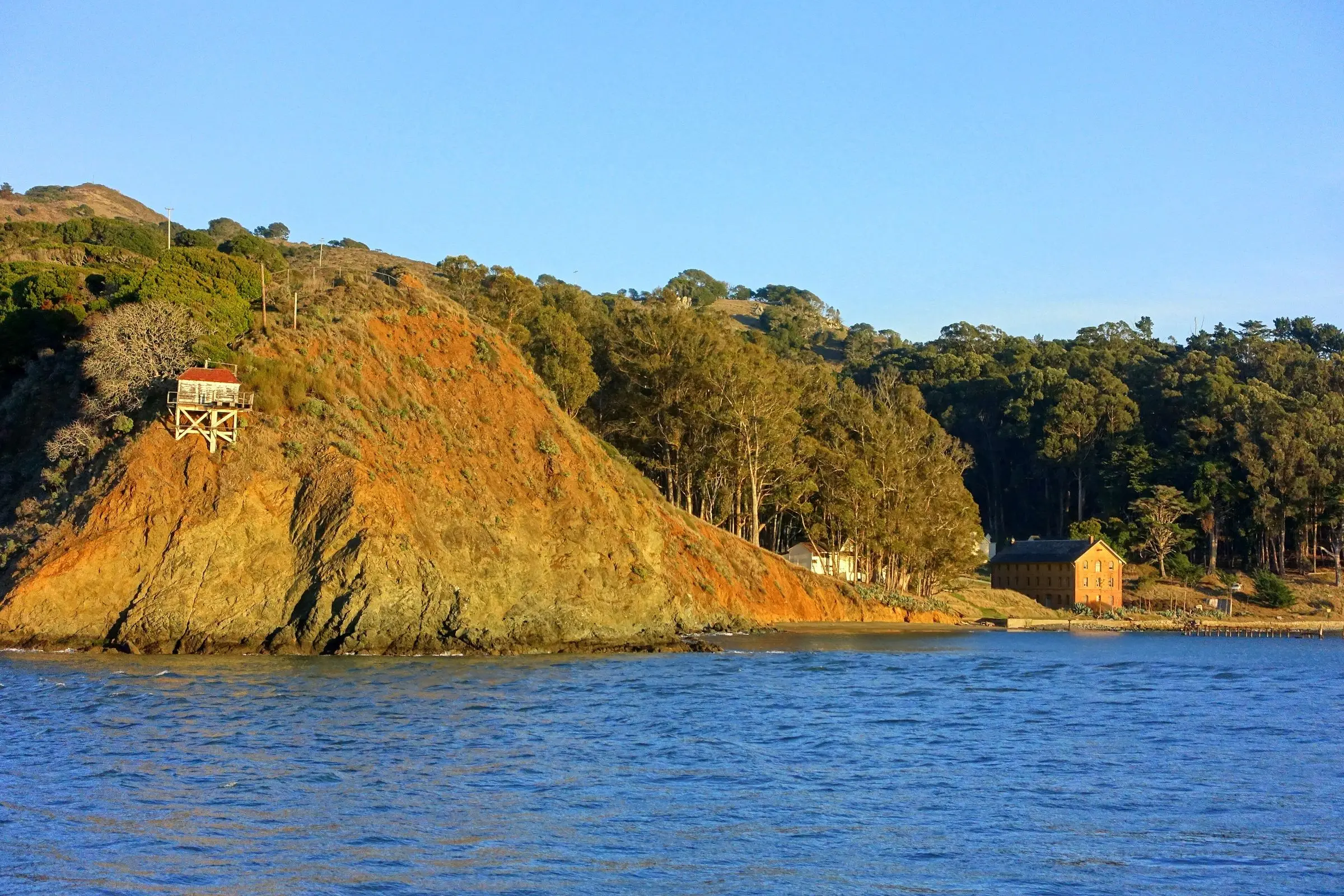 Angel Island rising from the blue water of San Francisco Bay in late light